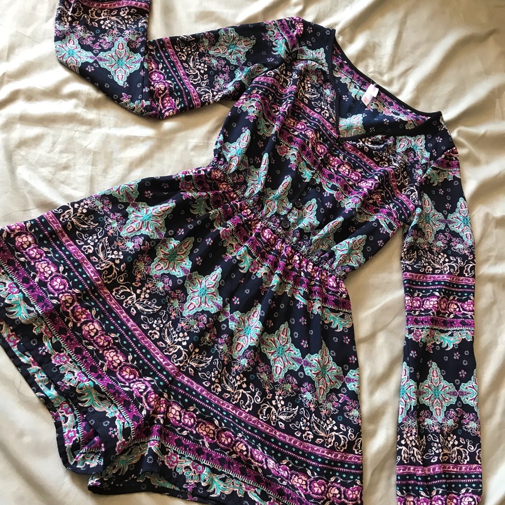 Long sleeve romper.
